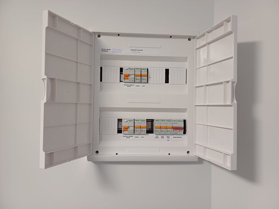 Double-door compliant switchboard installed in a Hamilton home